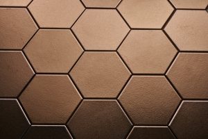 Hexagon wandtegel Onda bronze 15×17